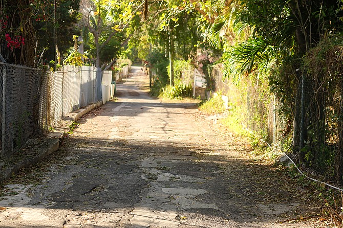 The paved path off Village road.