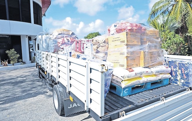 FOOD being delivered to the Bahamas Red Cross yesterday by the Chinese Community Association. Photos: Racardo Thomas