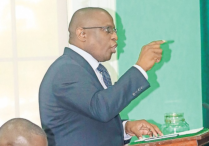 MINISTER of Agriculture and Marine Resources Michael Pintard in Parliament yesterday.
Photo: Donovan McIntosh/Tribune Staff