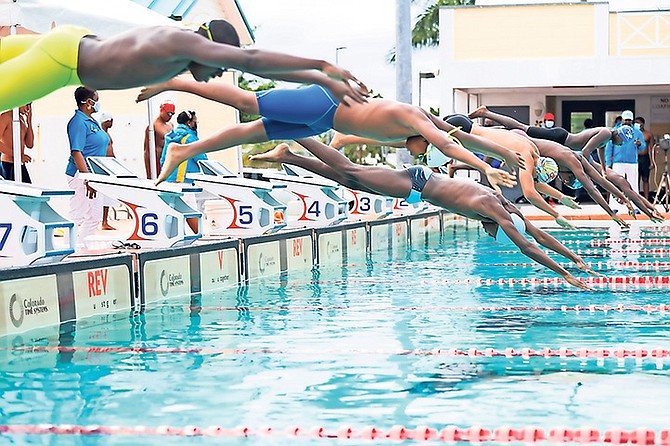 Despite the chilly weather conditions yesterday, the ninth annual LENO Barracuda Invitational Swim Meet turned out to a successful event at the Betty Kelly Kenning Swim Complex. Host Barracuda won the two-day meet with a total of 1,285.50 points, well ahead of second lace finishers Mako Aquatics Club, who had 734. The Blue Waves Swim Club got third with 542. The Alpha Aquatics was fourth with 463; Lyford Cay Swim Club was fifth with 206.
Photos: Racardo Thomas