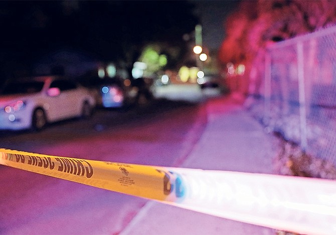 THE SCENE of last night’s shooting. Photos: Donovan McIntosh/Tribune Staff