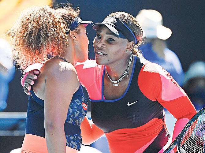 NAOMI OSAKA, left, is congratulated by Serena Williams, of the US, after Osaka won their semifinal match at the Australian Open tennis championship in Melbourne, Australia. Photo: Andy Brownbill/AP