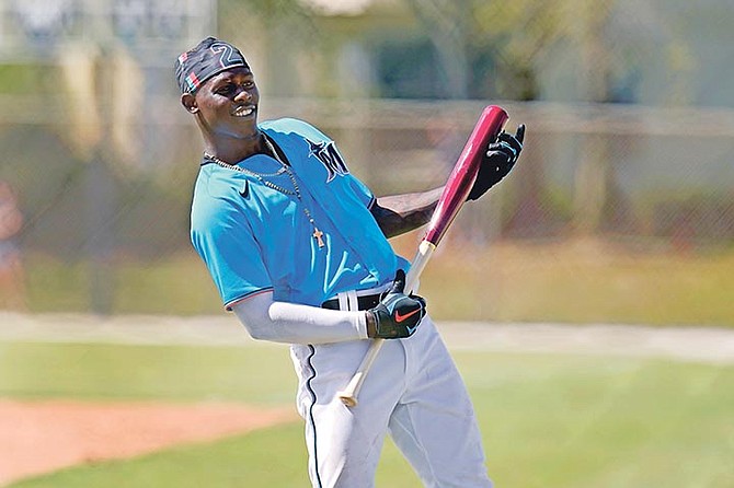 Miami Marlins’ Jazz Chisholm plays air guitar during spring training baseball batting practice on Friday in Jupiter, Florida.

(AP Photo/Jeff Roberson)