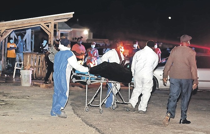 A BODY being removed from the scene last night after a jet ski collided with a boat off Anthol Island.
Photo: Racardo Thomas