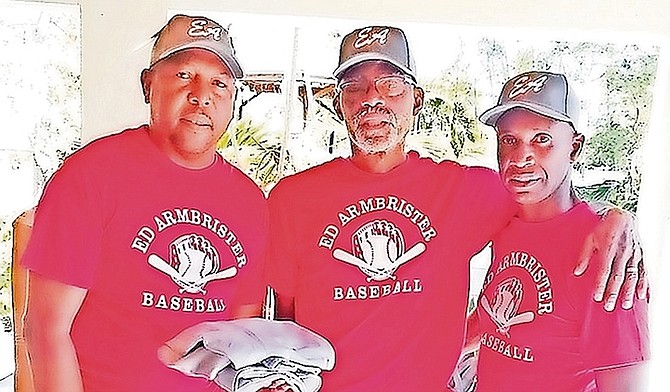 IN this file photo, sponsor Ivan “Showtime” Francis shares a moment with patron Ed Armbrister and co-ordinator Michael Butler of the Ed Armbrister Baseball League.