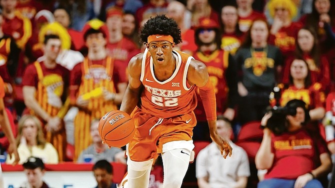 Texas forward Kai Jones officially announced last night that he will forego his college eligibility and declare for the 2021 NBA Draft.

(AP Photo/Charlie Neibergall)