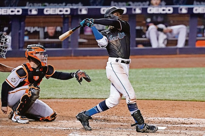 Miami Marlins’ Jazz Chisholm Jr hits a home run during the fifth inning against the San Francisco Giants on Friday, April 16, 2021, in Miami. 
                                                                                                                                (AP Photos/Marta Lavandier)