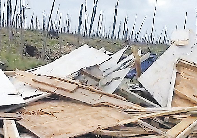 SOME of the debris after buildings in The Farm shanty town were demolished, in this image taken
from video.