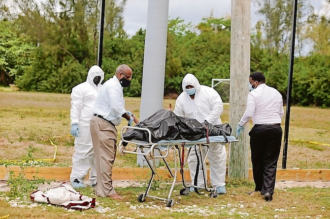 A BODY being removed from the scene at the Blue Hill soccer field yesterday. Photo: Donovan McIntosh/Tribune Staff