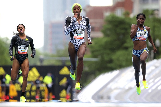 SHAUNAE Miller-Uibo winning the 200m at the Adidas Boost Boston Games, ahead of fellow Bahamian Tynia Gaither and American Kortnei Johnson. American Wadeline Jonathas is also pictured above.
Photo: Matthew J Lee/The Boston Globe