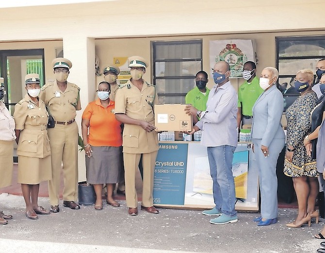 THE ROTARY Club of Nassau making a donation of electronics and sanitary equipment and supplies to the Bahamas Department of Correctional Services yesterday. Photo: Donovan McIntosh/Tribune Staff