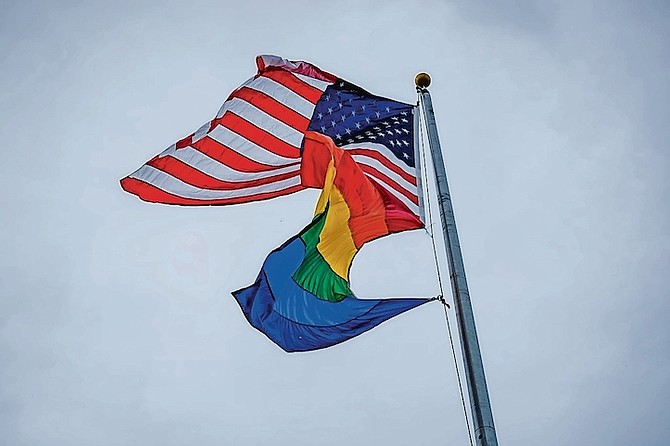THE PRIDE flag flying alongside the US flag at the US Embassy for Pride Month.