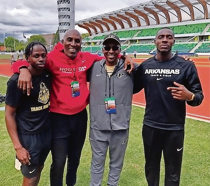 Bahamian triple jumpers, from left to right, are Purdue’s Tamar Greene, Olympic bronze medallist Frank Rutherford from Houston, Purdue’s head coach Norbert Elliott and Arkansas’ LaQuan Nairn at the NCAA Championships.