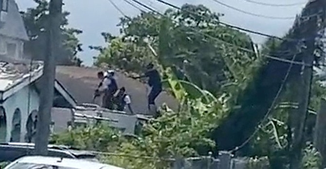 A still from video showing police during the shooting.
