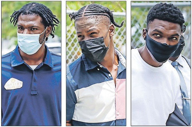FROM left, Justin Curtis, Philip Taylor and Zevargo Gaitor outside court. Photos: Racardo Thomas/Tribune Staff