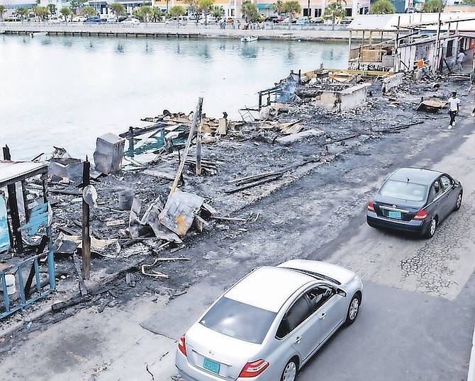 DAMAGE after the major fire at Potter’s Cay dock.