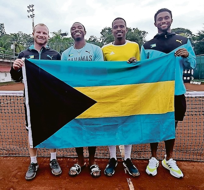 VICTORY SWEET: The Bahamas Davis Cup team (left to right) of Baker Newman, Kevin Major Jr, Marvin Rolle and Justin Roberts.