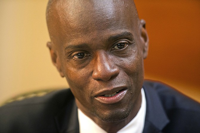 Haiti's President Jovenel Moise speaks during an interview at his home in Petion-Ville, a suburb of Port-au-Prince, Haiti last year. Sources say Moise was assassinated at home, first lady hospitalised amid political instability. (AP Photo/Dieu Nalio Chery, File)