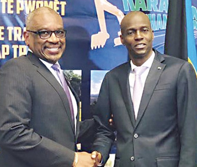 PRIME Minister Dr Hubert Minnis pictured previously with Haiti President Jovenel Moise, who has been assassinated at his home. The Bahamas embassy in Haiti has been ordered closed in the wake of the killing.