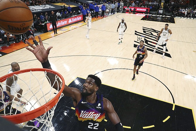Phoenix Suns centre Deandre Ayton (22) shoots during the second half against the Milwaukee Bucks in Game 5 of basketball's NBA Finals, Saturday, July 17, 2021, in Phoenix. (Mark J. Rebilas/Pool Photo via AP)