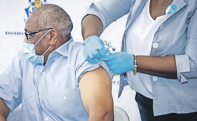 PRIME Minister Dr Hubert Minnis pictured when receiving his vaccination.