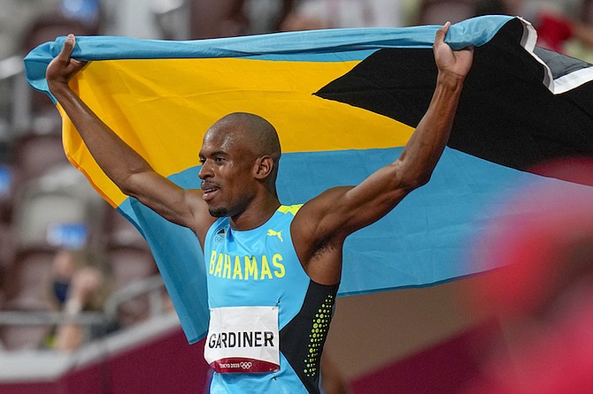 Steven Gardiner celebrates after winning the men's 400-metre final at the 2020 Summer Olympics, in Tokyo. (AP Photo/Petr David Josek)