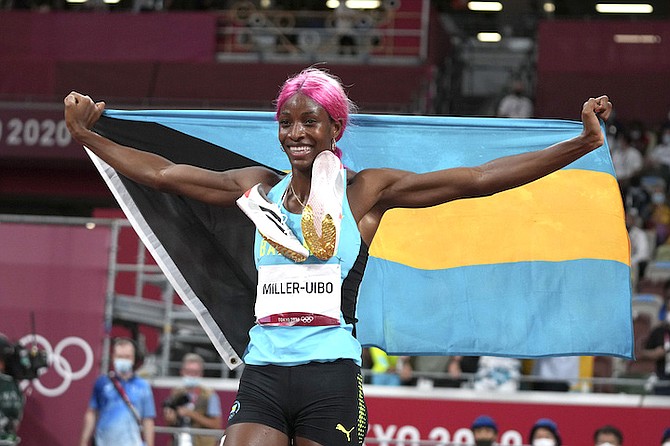 Shaunae Miller-Uibo celebrates after winning the gold medal in the women's 400-metre final at the 2020 Summer Olympics, Friday in Tokyo. (AP Photo/Matthias Schrader)