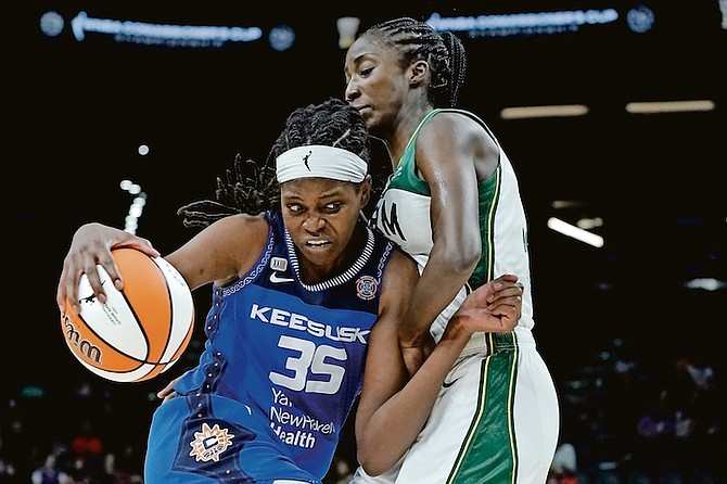 CONNECTICUT Sun forward Jonquel Jones (35) drives during the second half of the Commissioner’s Cup WNBA basketball game on August 12 in Phoenix. 
(AP Photo/Matt York)