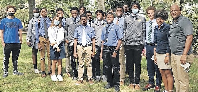 BAHAMIAN recruiter Philip ‘Tappy’ Davis, far right, poses with Bahamian students at Webb School.