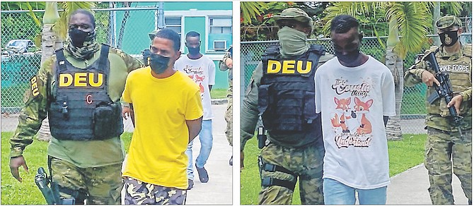 TWO Jamaican nationals outside court on Friday. Damond Osmond Shawn, 44, left, and Daniel Grant, 24, both pleaded guilty to drug-related charges. Photos: Donovan McIntosh/Tribune Staff