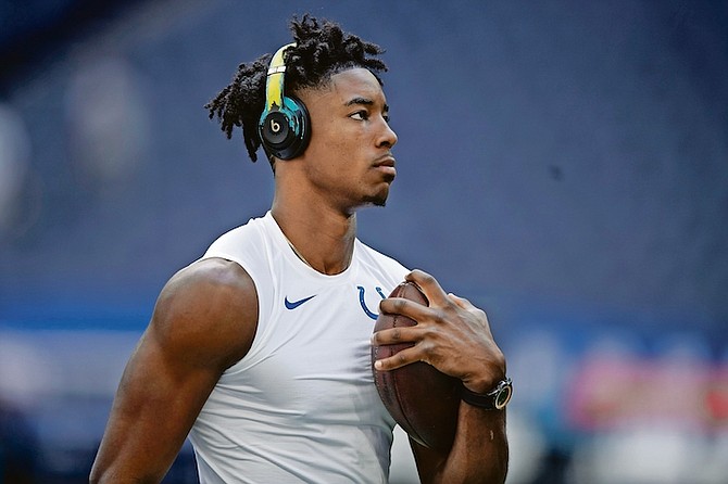 Indianapolis Colts wide receiver Mike Strachan (17) warms up on the field before an NFL football game against the Carolina Panthers, Sunday, Aug. 15, 2021, in Indianapolis. (AP Photo/Zach Bolinger)