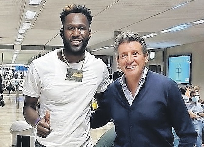 DONALD THOMAS, pictured sharing a moment with World Athletics’ president Lord Sebastian Coe at the airport, told The Tribune he is pleased with his progress this season, rising from a rank of 70 in the world to 13 after a comeback from injury.