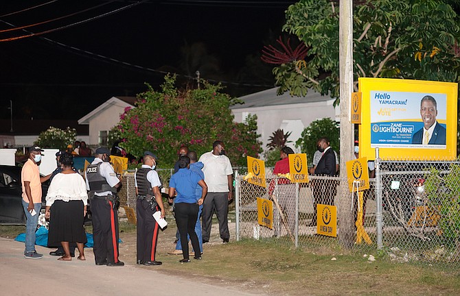 Police at the scene of the stabbing outside the Progressive Liberal Party’s Yamacraw constituency office. Photo: Donavan McIntosh/Tribune staff