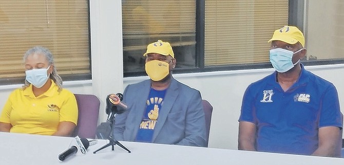 PLPs claim FNMs are unfairly campaigning after curfew. Keith Russell, centre, at a press conference at PLP campaign office at Regent Centre is flanked by Chayla Cartwright and PLP candidate for Marco City Curt Hollingsworth. Photo: Denise Maycock/Tribune Staff
