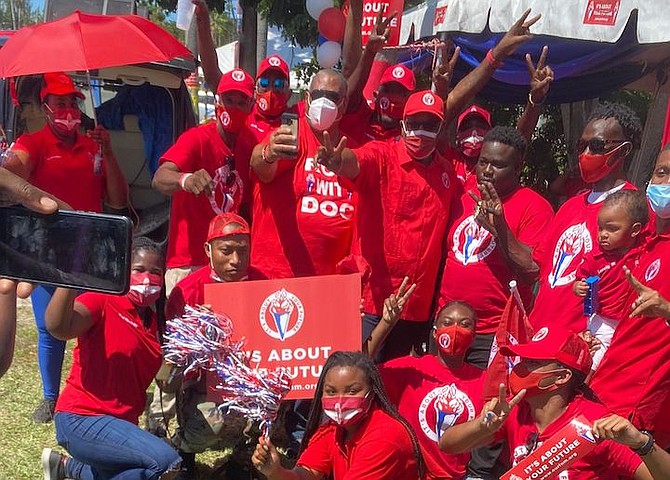 Prime Minister Dr Hubert Minnis with supporters after voting.