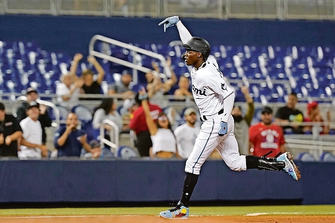 Miami Marlins Jasrado “Jazz” Chisholm Jr gestures after hitting his second solo home run of a baseball game during the fifth inning against the Washington Nationals yesterday in Miami.

(AP Photo/Marta Lavandier)