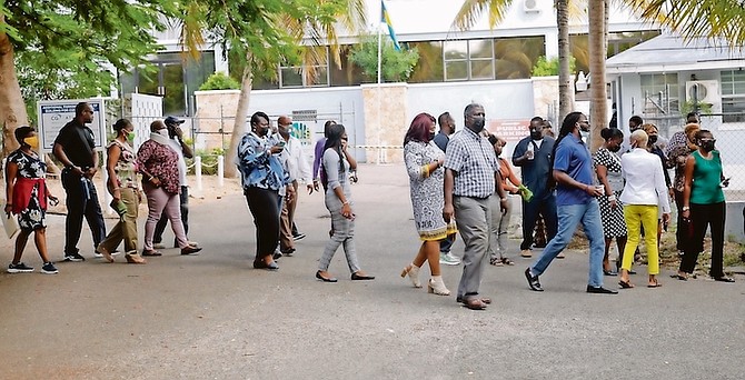 ZNS employees walked out yesterday in protest over medical contributions being deducted from salaries without permission. Photo: Donovan McIntosh/Tribune Staff