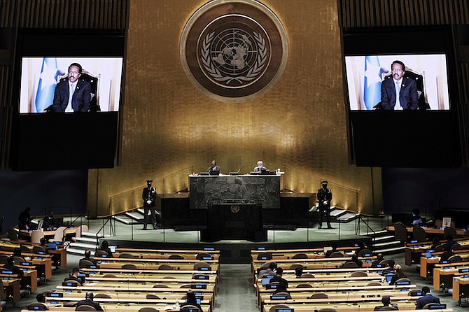 SOMALIA’S President Mohamed Abdullahi Mohamed Farmajo is seen on a video screen as he addresses the 76th Session of the United Nations General Assembly remotely on Tuesday at UN headquarters. Photo: Spencer Platt/AP