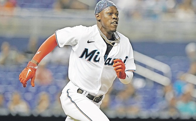 MIAMI Marlins’ Jasrado “Jazz” Chisholm Jr runs to first base during a baseball game against the
Washington Nationals on Wednesday in Miami.
(AP Photo/Marta Lavandier)
