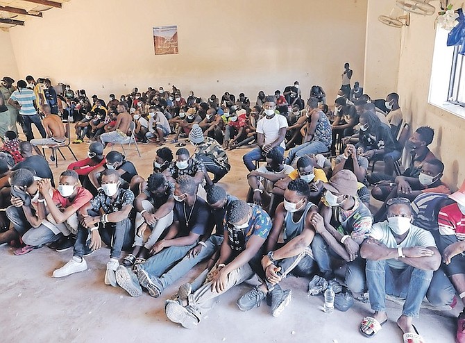 A GROUP of migrants being held at a church in Inagua.
Photo: Donovan McIntosh/Tribune Staff