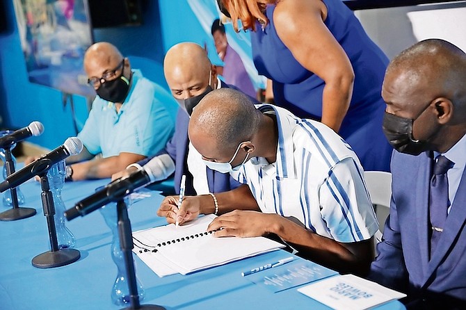 THE signing at BTC’s flagship store at the Mall at Marathon was attended by newly appointed Minister of Youth, Sports and Culture, Mario Bowleg, and Bahamas Olympic Committee president Romell Knowles, along with some of their executive officers.
Photos by Racardo Thomas/Tribune Staff