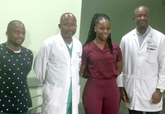Professor Dr Magnus Ekedede, 2nd from left, along with Dr Bain and Dr Freeman Lockhart, Medical Chief of Staff at GB Health Services, announced the first neurosurgery at the Rand Memorial Hospital on Saturday.