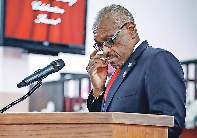 Former Prime Minister Dr Hubert Minnis wipes a tear away at a church service yesterday marking 50 years of the Free National Movement, during which he thanked supporters having ruled out any bid to continue as party leader. 
Photo: Racardo Thomas/Tribune Staff