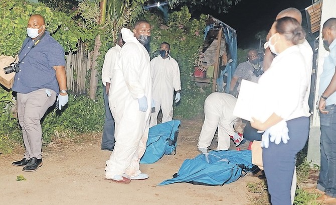 THE SCENE of a triple murder in the Fort Fincastle area where two men died on the scene and a third died of his wounds later.
Photo: Donovan McIntosh/Tribune Staff