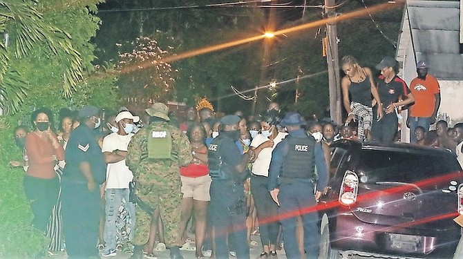 THE CROWD at the scene of the shooting in the Fort Fincastle area on Friday.
Photos: Donovan McIntosh/Tribune Staff
