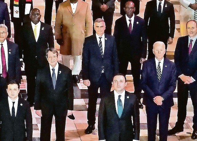 Prime Minister Philip “Brave” Davis, top left, alongside US president Joe Biden, bottom right, and other world leaders in a group photograph to mark the opening day of the COP26 UN Climate Summit in Glasgow, Scotland, yesterday. Photo: Alberto Pezzali/AP