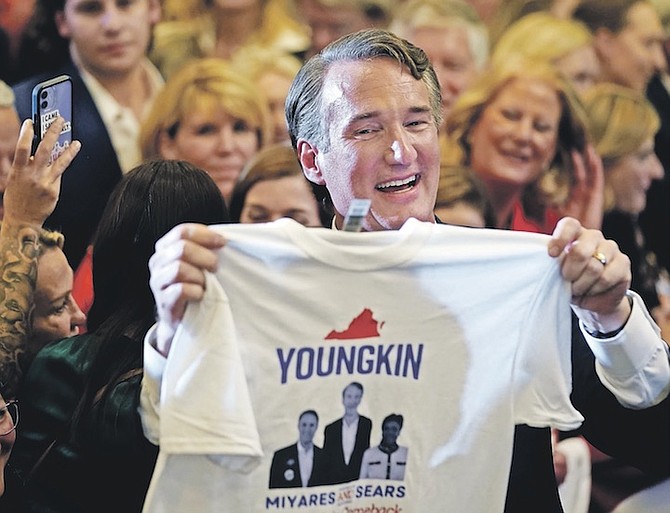VIRGINIA Governor-elect Glenn Youngkin greets supporters at an election night party in Chantilly after he defeated Democrat Terry McAuliffe. Photo: Andrew Harnik/AP
