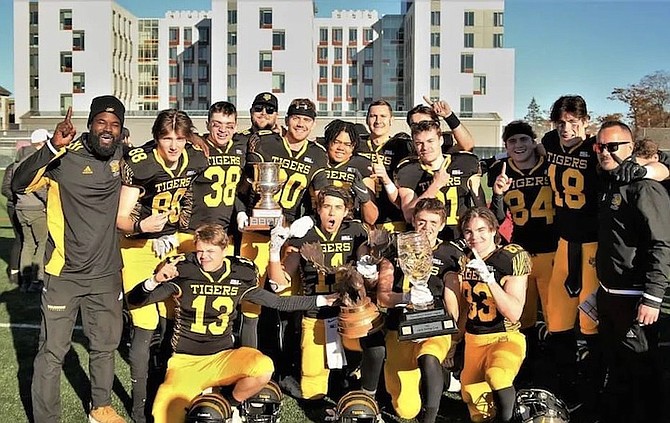 THE TIGERS claimed the Moosehead Cup with a 40-14 victory over the University of New Brunswick Red Bombers in Halifax, Nova Scotia, Canada, November 8.