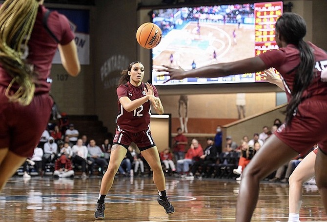 SOUTH Carolina’s Brea Beal passes to teammate Laeticia Amihere during NCAA college basketball game against South Dakota on Friday, November 12, at the Sanford Pentagon in Sioux Falls, S.D. 
(Erin Woodiel/The Argus Leader via AP)