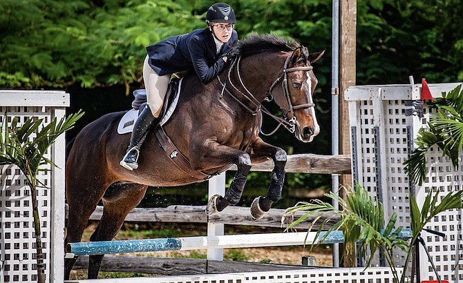 A SPORT for all ages: Local veterinarian Dr Amanda Pinder rode Eve McLeod’s Double Take to a 3-way tie for Novice Jumpers Reserve Champion.